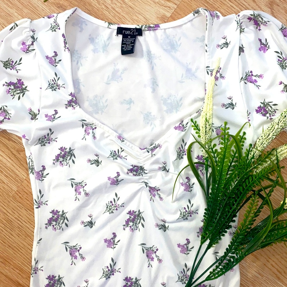 White body suit with lavender print